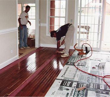 Flooring installation by Sun Coast Builders